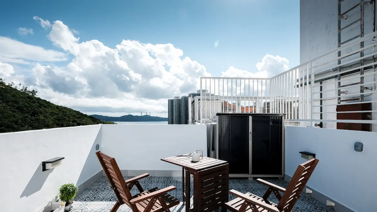 Beautiful sky view with Spanish tiles and white wall in hk