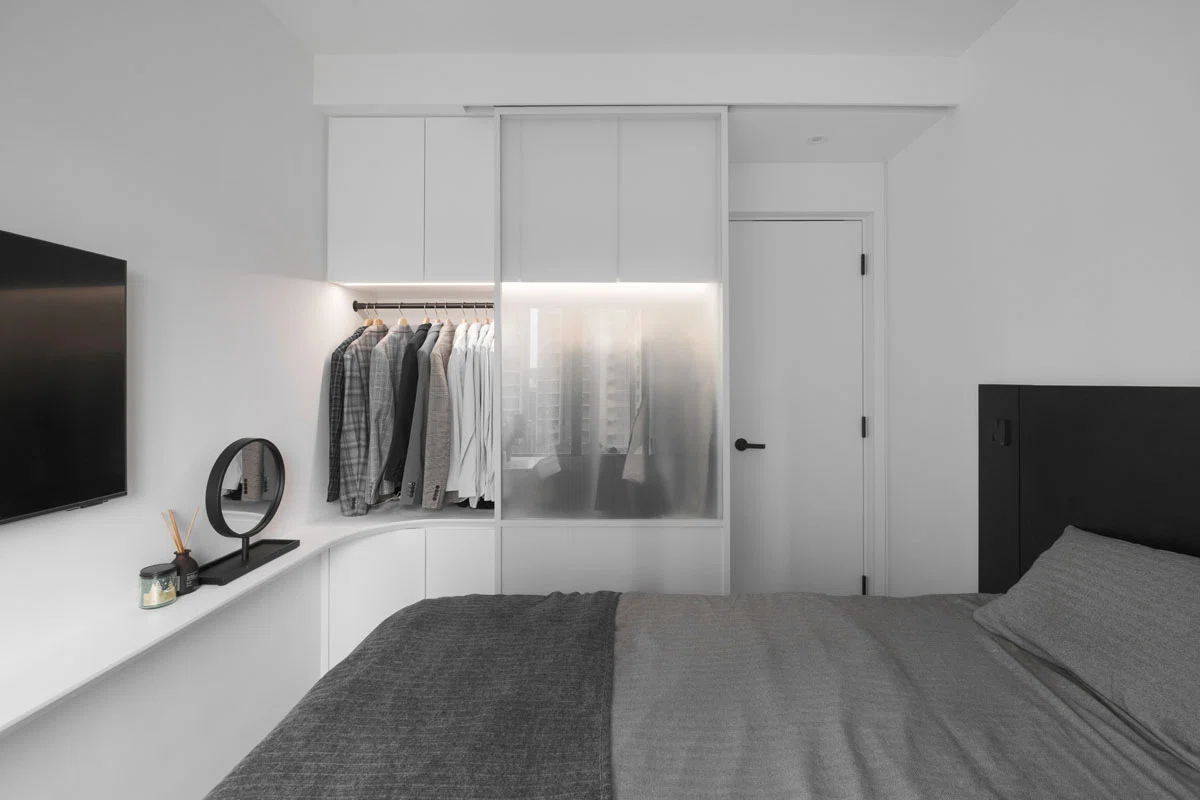 Minimalist bedroom with closet design in aqua marine