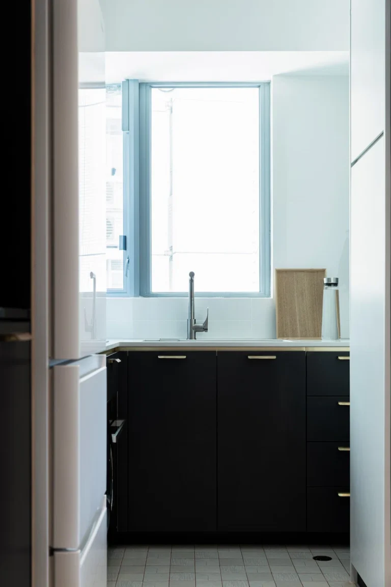 kitchen design in larvotto with black cabinet